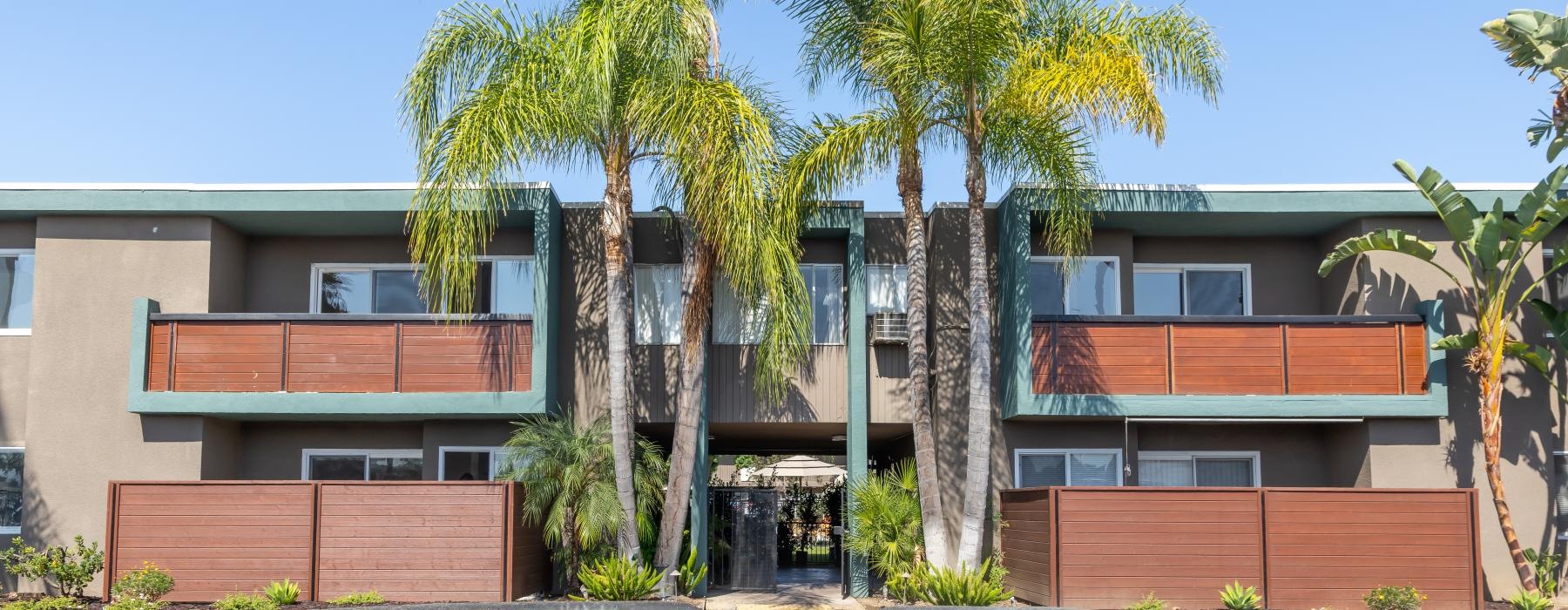 a building with palm trees