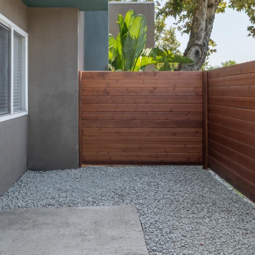a fenced-in patio enclosure
