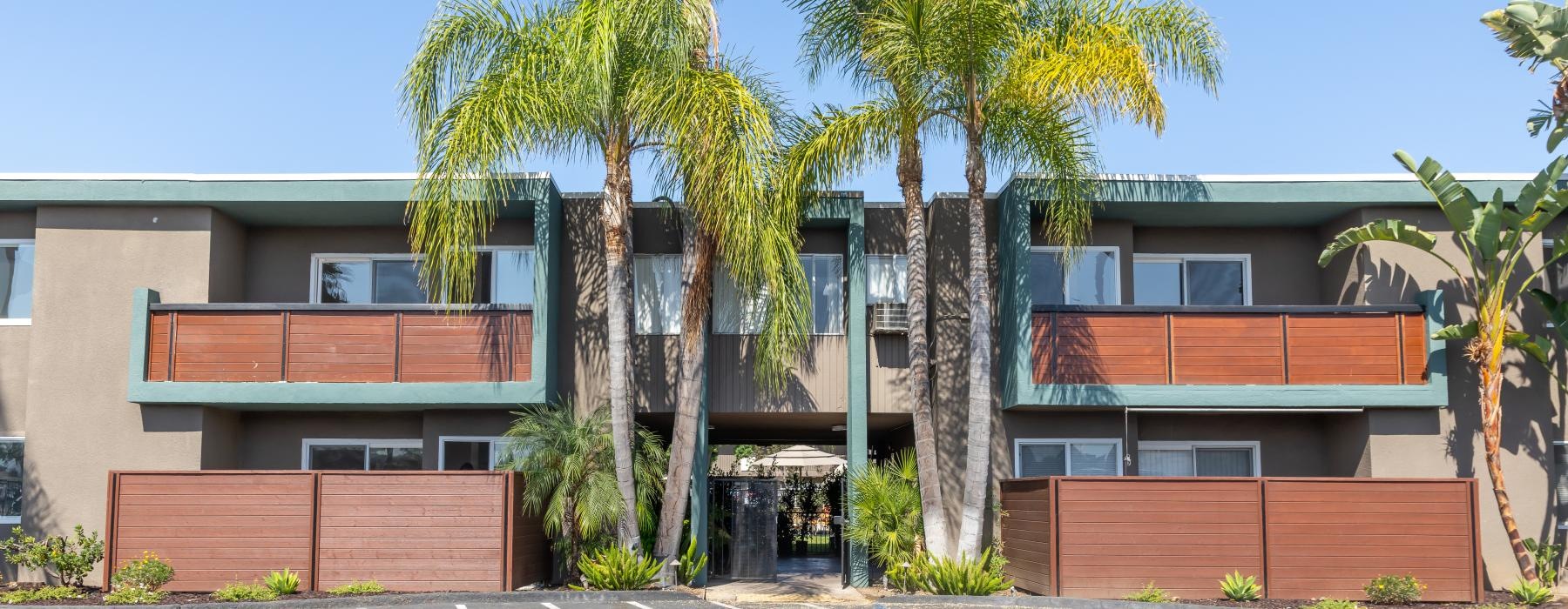 a building with palm trees
